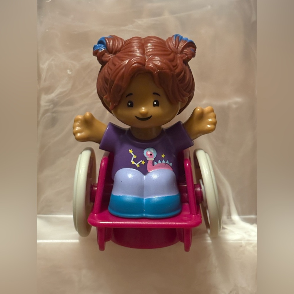 NWOT Little People girl with brown hair and purple shirt in a wheelchair